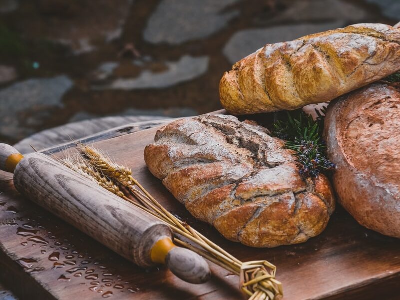 brown bread on brown wooden chopping board