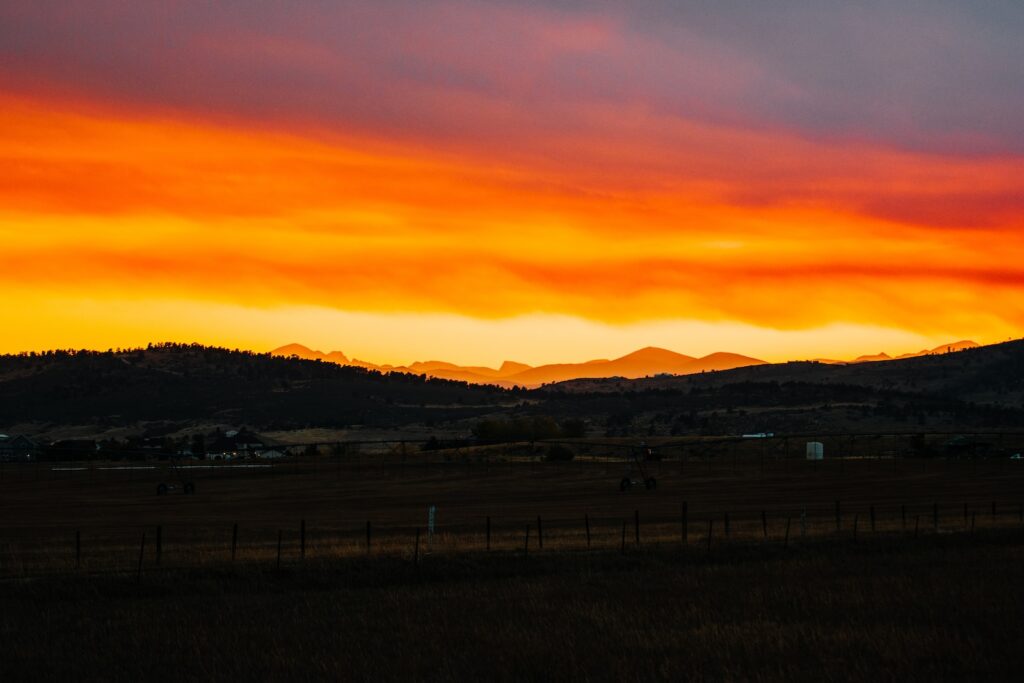 silhouette of mountains during sunset